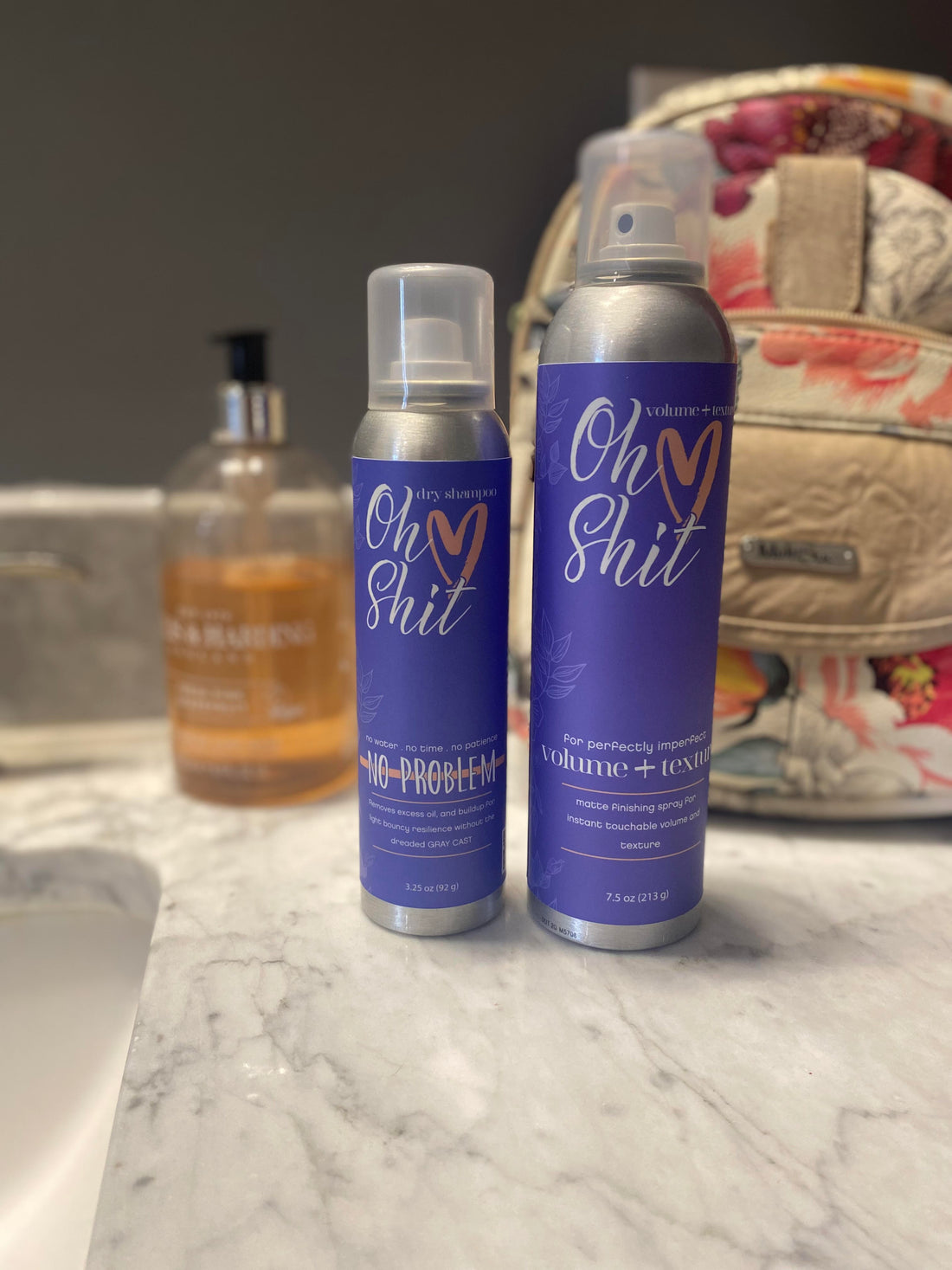 What Distinguishes Oh Shit Dry Shampoo From Oh Shit Volume + Texture Spray?